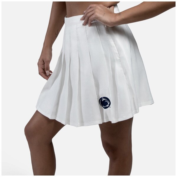 model wearing white women's tennis skirt with embroidered Penn State Athletic Logo